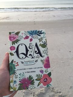 On the beach at sunrise with my favorite prompted journal.